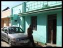 Car infront of native home