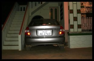 Car in house